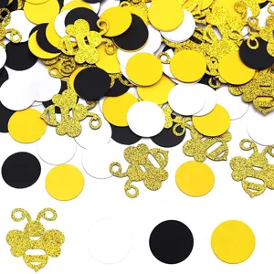 Bee theme party confetti glitter gold bee and black white yellow paper circles table decor