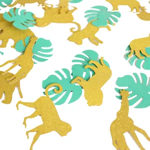 Glitter jungle dieren confetti goud groene palmbladeren feest tafeldecoratie