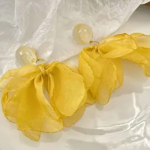 Elegant yellow chiffon flower earrings, lightweight layered petal design for daily wear.