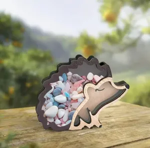 Wooden hedgehog shaped piggy bank detail with colorful stones inside for kids room
