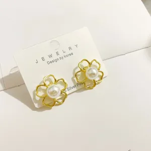 Korean vintage floral pearl stud earrings with S925 silver needle, elegant minimalist jewelry.