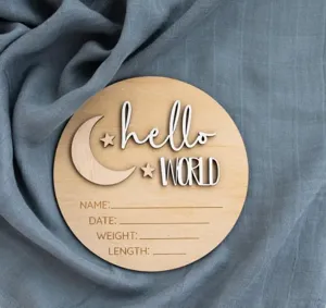 Wooden newborn birth announcement plaque with hello world moon star details for photography prop.