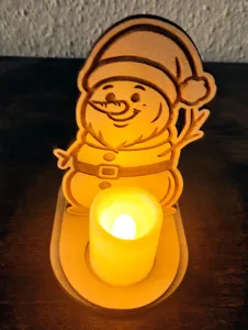 Wooden Christmas LED candle holder with snowman design, festive desktop decoration.