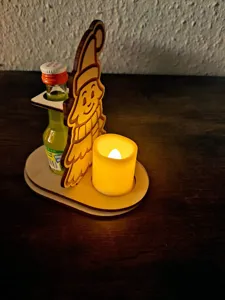 Wooden angel candle holder detail view, desktop decoration ornament for home holiday and party use.