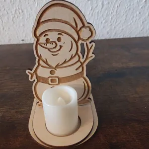 Wooden Christmas snowman candle holder with LED tea light for holiday home table decor ornament.