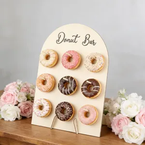 Wooden arched donut display stand detail, perfect for wedding party dessert table decoration.