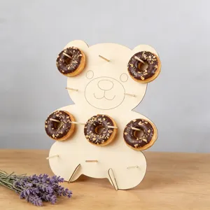 Wooden bear donut wall display stand detail view, perfect for party dessert table setup.