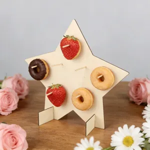 Wooden star dessert display stand with donuts and strawberries, perfect for party decor.