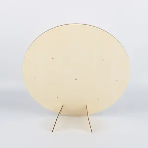Wooden round display board detail view showing natural wood grain and stable support feet.