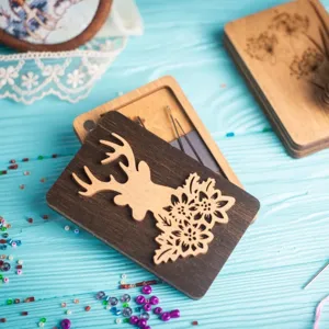 Wooden embroidery needle case set with magnetic closure, portable sewing tool storage box.