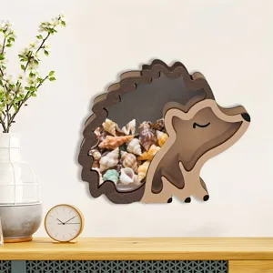 Wooden hedgehog piggy bank with cute sea shells inside, perfect children coin storage box.