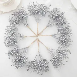 Silver artificial berry stems detail shot, perfect for Christmas wreaths and DIY crafts.