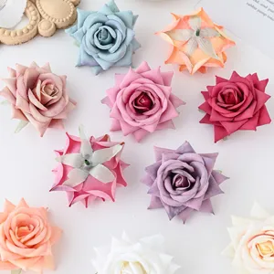 Artificial velvet rose flower heads for DIY crafts, wedding decoration, and floral design.