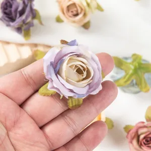 Vintage artificial silk rose flower heads detail view, perfect for DIY crafts and wedding decor.