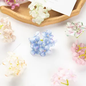 Artificial silk hydrangea flower heads for DIY crafts, hair accessories and wedding decor details.