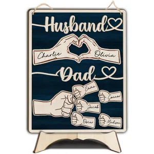 Custom wooden handprint sign for Father's Day, personalized family name plaque decor.