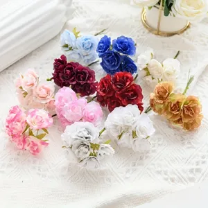 Detailed view of colorful artificial mini flower bouquets, perfect for home decor and DIY crafts.