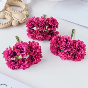 Detailed view of vibrant pink artificial silk flower clusters, perfect for DIY crafts and decor.