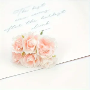 Close-up detail of light pink artificial peony flower bouquet, soft silk floral material