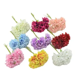 Colorful artificial miniature flower bouquets for DIY crafts, wreaths, and wedding decorations.