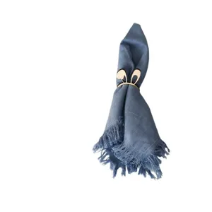 Easter wooden bunny ear napkin ring set with blue tassel cloth napkin for table decor.