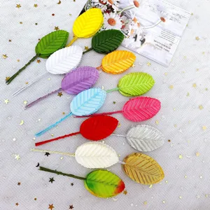 Colorful artificial wire leaves for DIY craft garlands and wedding party decoration accessories.