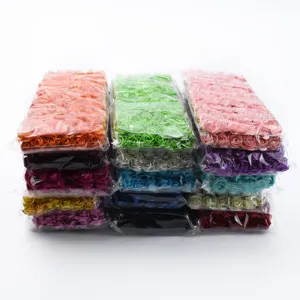 Colorful artificial foam rose heads detail close up view, perfect for DIY craft decoration.