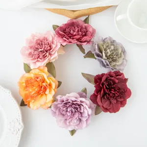 Têtes de fleurs artificielles pivoines roses pour décoration murale mariage DIY et loisirs.
