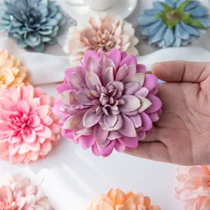 Artificial dahlia flower head close-up, fabric decorative floral for wedding and craft DIY.
