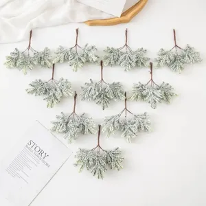 Artificial frosted pine branch stems for Christmas tree decoration wreath DIY crafts supplies.