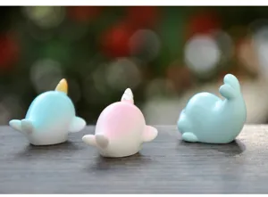Detailed close-up of cute mini cartoon whale resin figurine, perfect for micro landscape decor.