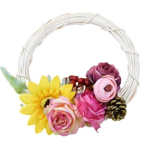 Off-white wicker wreath with artificial flowers, perfect for Christmas home door decoration.
