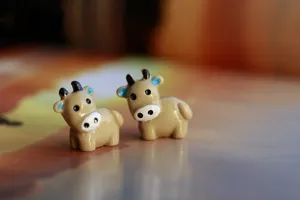Miniature resin cow figurine micro landscape cute animal ornament detail close up view