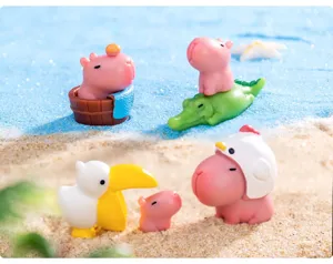 Conjunto de mini figuras de capibara rosa lindo para decoración de escritorio y pastel.