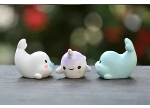 Mini cartoon marine animal blind box figurine detail, cute resin seal desktop micro landscape.