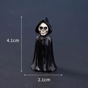 Mini Halloween grim reaper skeleton figurine ornament with black cloak, measuring 4.1cm tall.