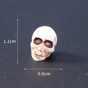 Mini resin skull figurine, Halloween micro landscape ornament, 1.1x0.9cm spooky decor.