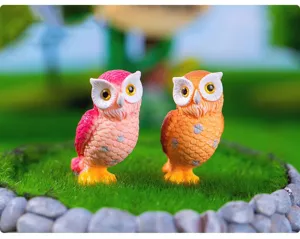 Detailed view of cute resin owl figurines for micro landscape gardening and desktop decoration.