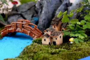 Close-up detail van miniatuur hars huizen en mos landschap Scenery voor tuindecoratie rekwisieten.