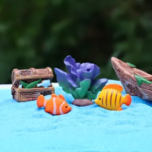 Miniature ocean resin figurines set with clownfish, treasure chest, and coral for micro landscape.