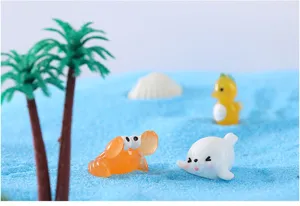 Detailed shot of cute resin ocean animal ornaments, miniature crab, seal and seahorse toys.