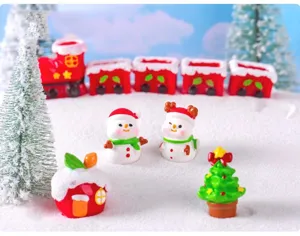 Christmas miniature resin landscape ornaments set, cute snowman and train winter snow decor details.