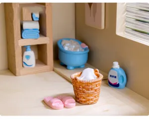 Miniature dollhouse bathroom decoration set including tiny laundry basket bathtub and washing machine.
