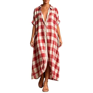 Detailed view of the red and white gingham short sleeve shirt dress, relaxed fit, button down.