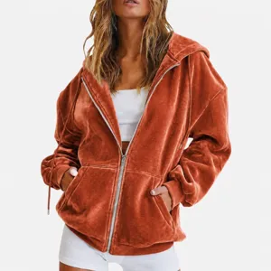 Velour zip-up hoodie detail showcasing soft texture, loose fit, and comfortable front pockets.