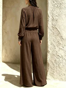 Back view details of women casual brown two-piece set featuring loose top and pants.