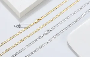 Macro view of 3.3mm S925 sterling silver Figaro chain in gold and silver finish