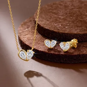 Detailed shot of sparkling moissanite heart necklace and matching stud earrings set