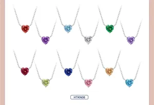 Collection of heart-shaped pendant necklaces with multi-color zircons on silver chains