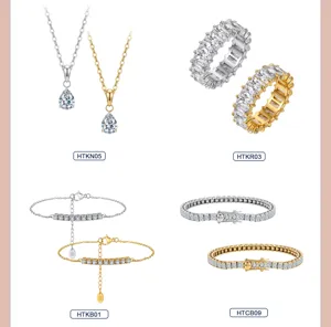Showcase of gold and silver plated stainless steel jewelry sets with cubic zirconia